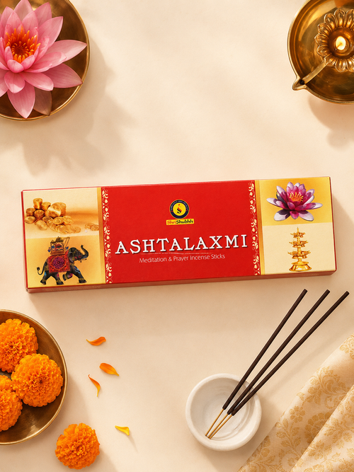 ASHTALAXMI incense sticks packaging with incense sticks and decorative elements on a light background